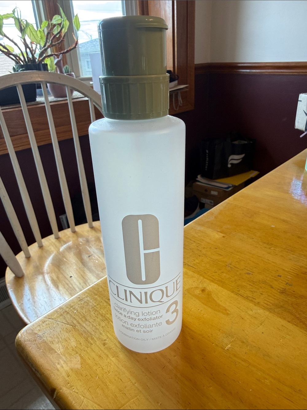 Clinique EMPTY clarifying lotion container with pump.